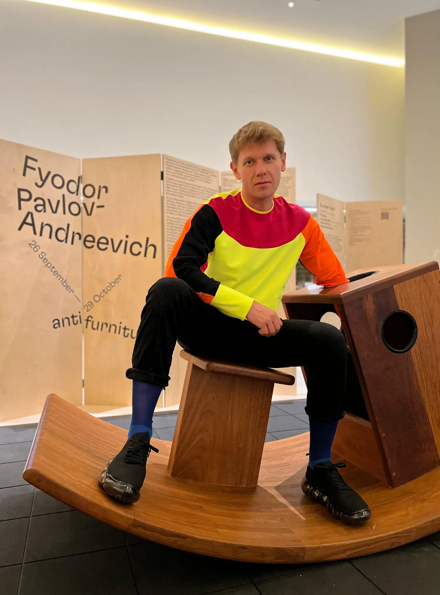 Fyodor Pavlov-Andreevich seated inside an exhibition